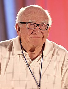 How tall is Ed Asner?